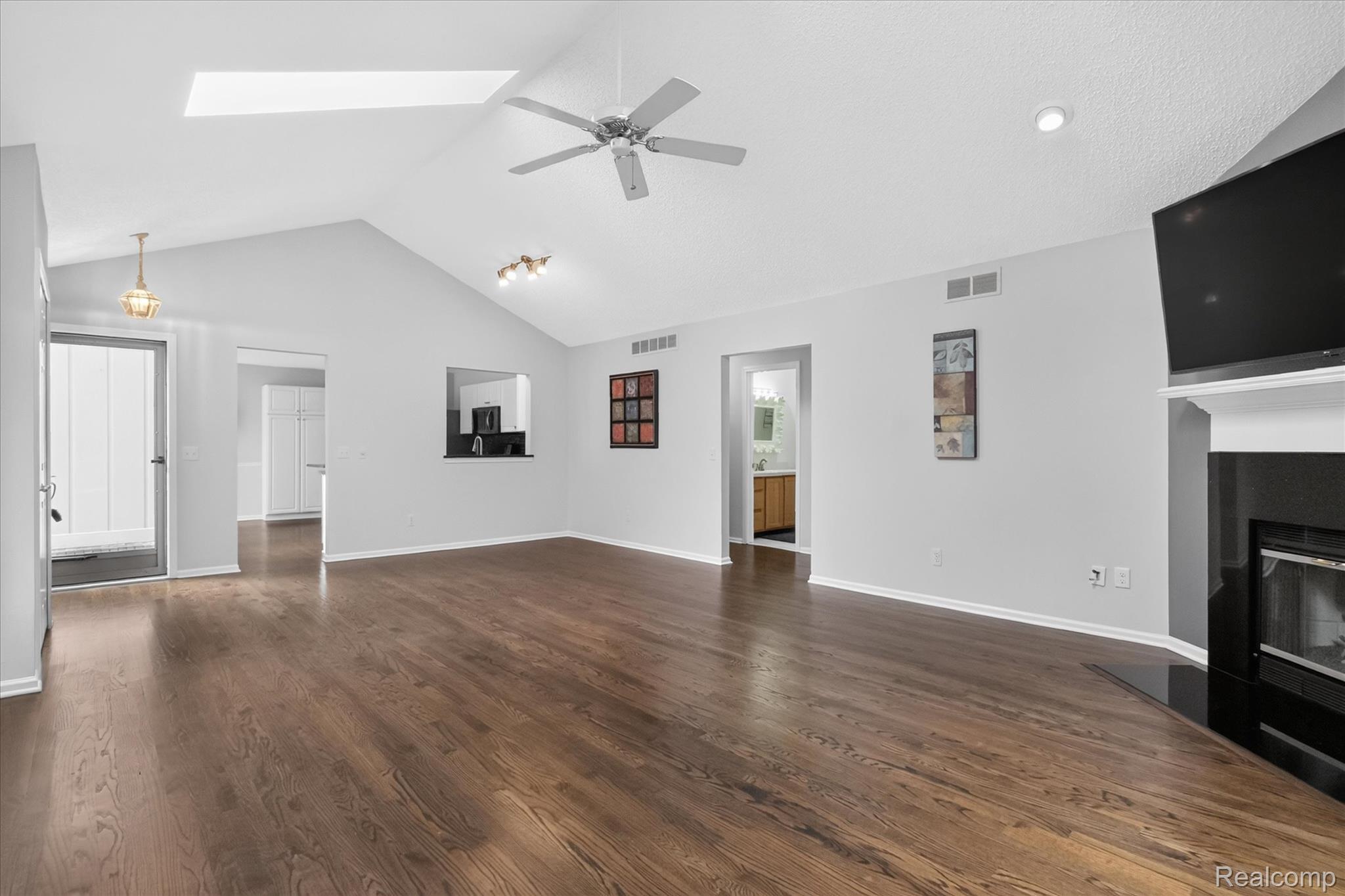 21660 River Ridge Trail Farmington, MI 48335 - Photo 16 of 48 GREAT ROOM - SKY LIGHTS- VAULT CEILINGS