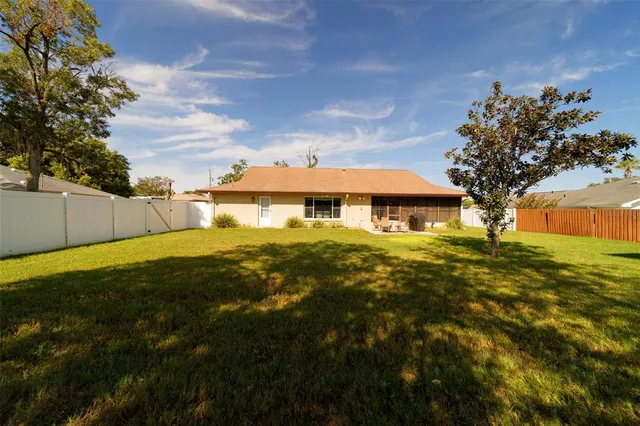 a view of a backyard with a garden