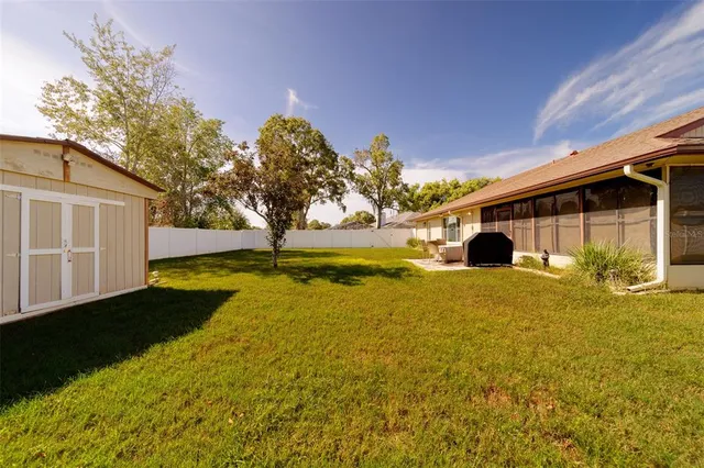 an aerial view of a house with a garden