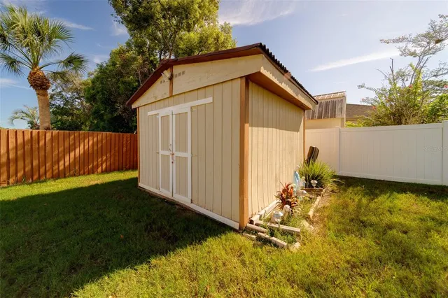 an aerial view of a house with a garden