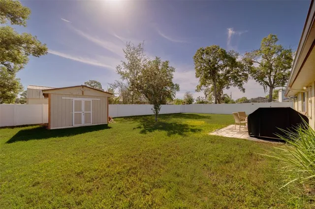 an aerial view of a house with a garden