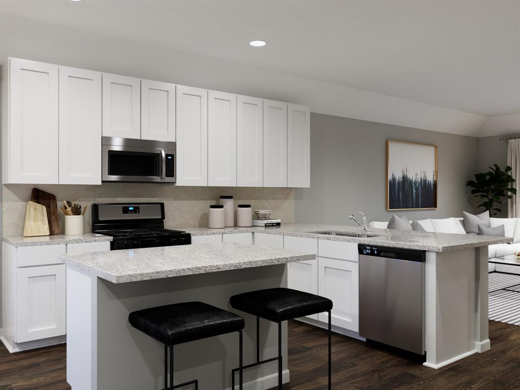 1104 Runway Road Fort Worth, TX 76131 - Photo 21 of 36 a kitchen with a sink stove and microwave