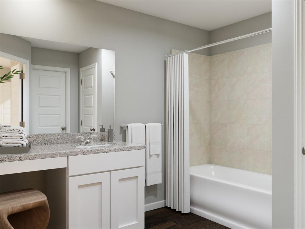 1104 Runway Road Fort Worth, TX 76131 - Photo 27 of 36 a bathroom with a granite countertop sink a toilet and shower