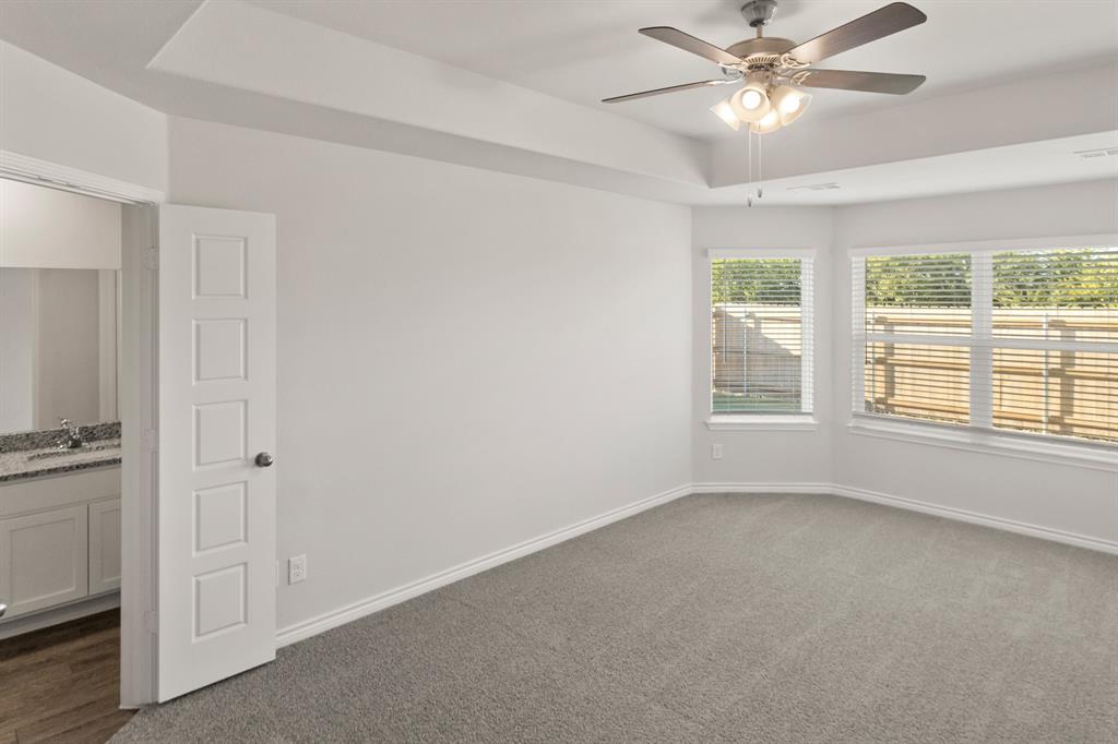1104 Runway Road Fort Worth, TX 76131 - Photo 9 of 36 a view of an empty room with a window