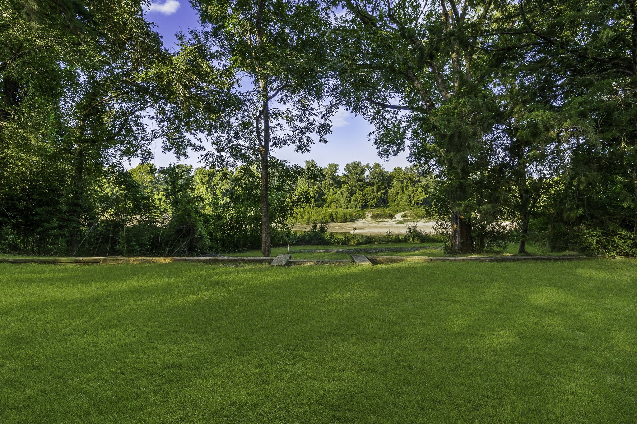 450 River Road Goodrich, TX 77335 - Photo 27 of 40 Back yard riverfront view
