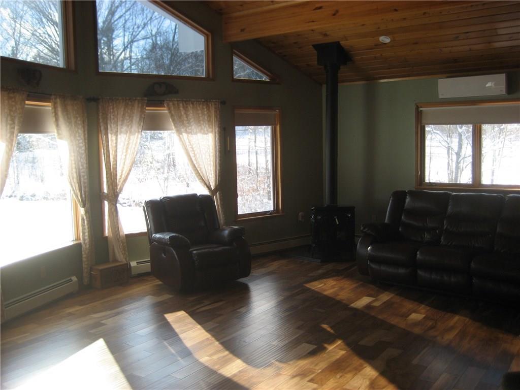 193 Carroll Road Union, ME 04862 - Photo 23 of 35 Living room with cathedral ceilings...