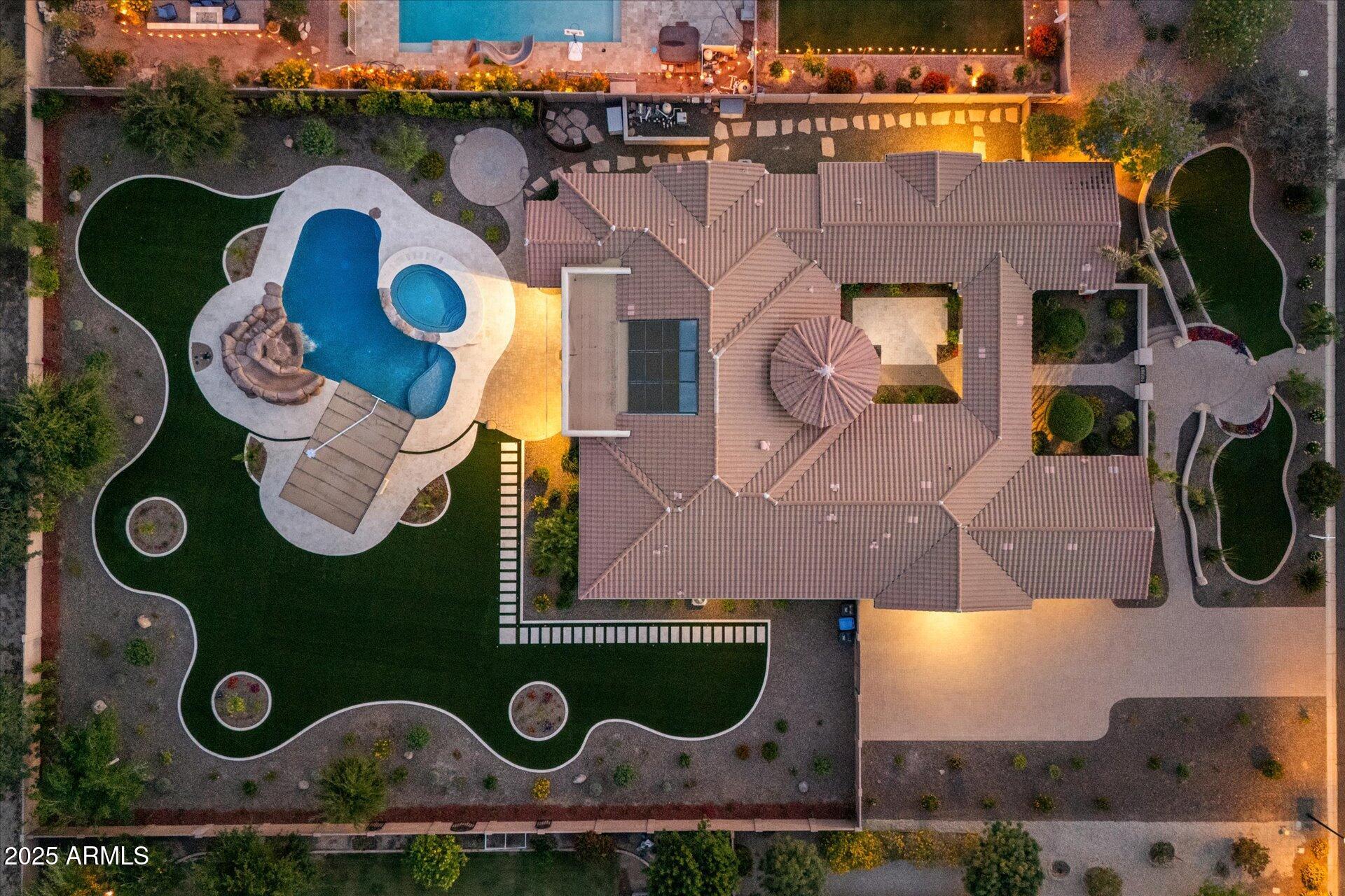 4547 South Banning Drive Gilbert, AZ 85297 - Photo 10 of 45 an aerial view of residential house with outdoor space and parking