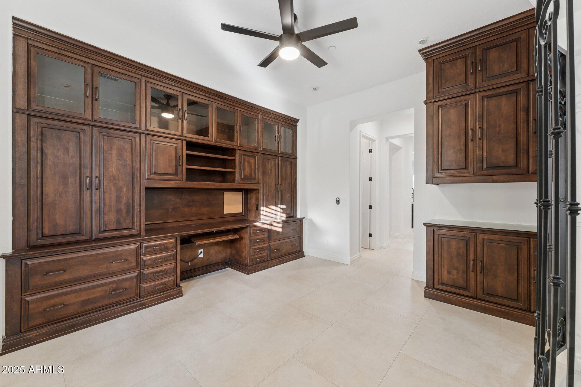 4547 South Banning Drive Gilbert, AZ 85297 - Photo 26 of 45 a kitchen with granite countertop cabinets stainless steel appliances and a window