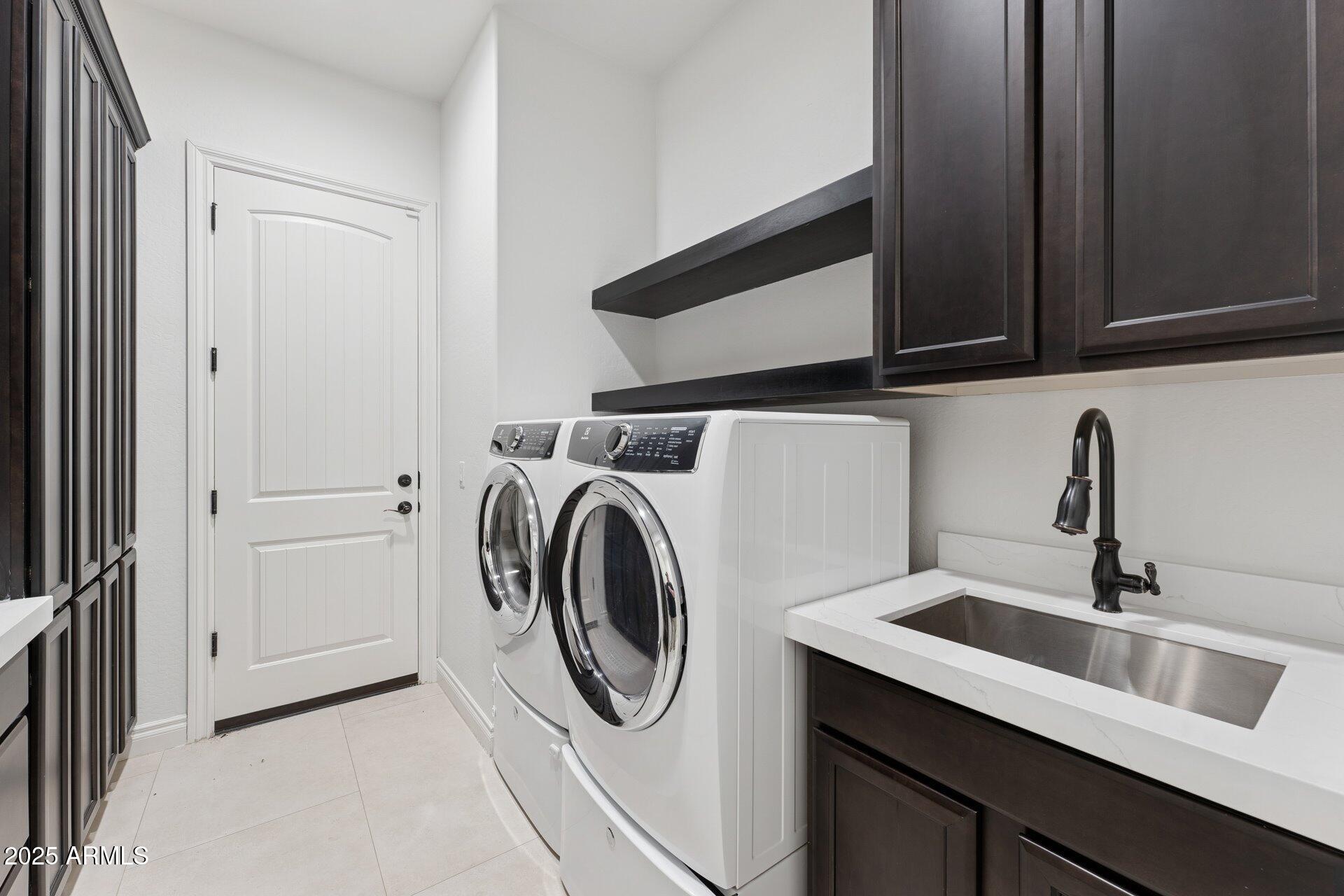 4547 South Banning Drive Gilbert, AZ 85297 - Photo 34 of 45 a utility room with sink dryer and washer