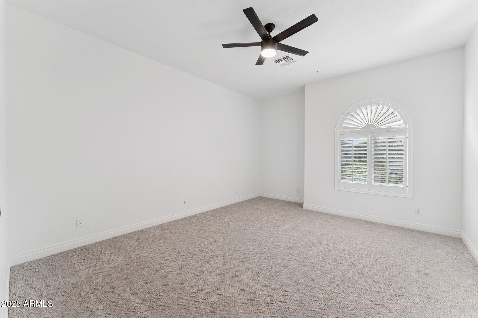 4547 South Banning Drive Gilbert, AZ 85297 - Photo 40 of 45 an empty room with a window