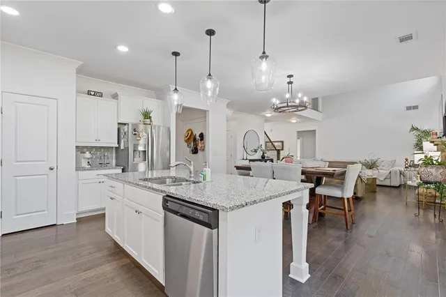 a bedroom with a bed and furniture