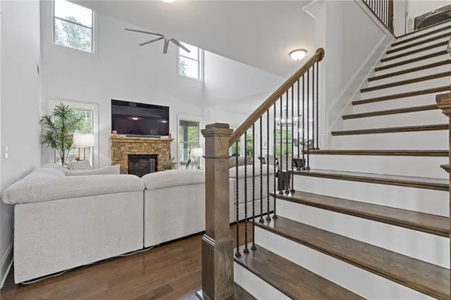 a bedroom with a bed and a television