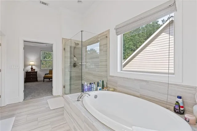 a bedroom with a bed and dresser