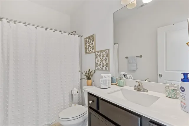 an aerial view of residential house with outdoor space