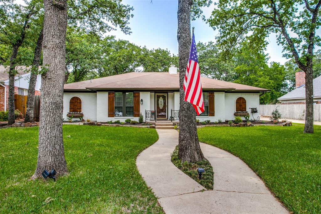 1008 Conchos Circle West Keller, TX 76248 - Photo 1 of 1 a front view of a house with garden