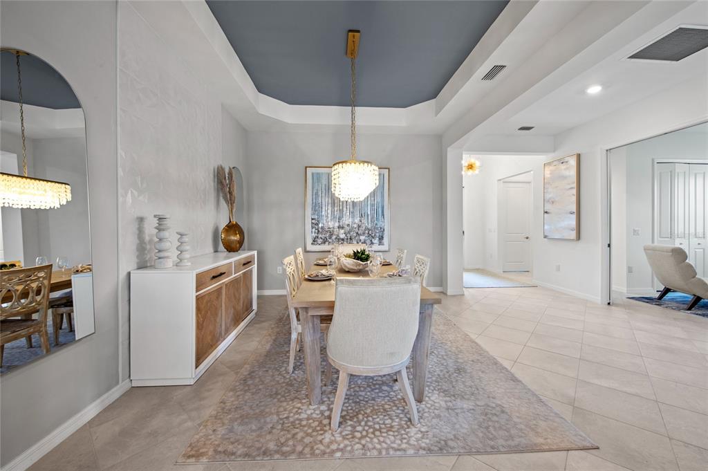 7161 Inlet Isles Lakewood Ranch, FL 34202 - Photo 14 of 29 a view of a kitchen and dining room