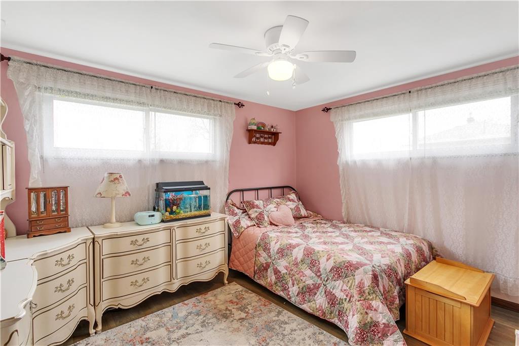 512 Middletown Road New Stanton, PA 15672 - Photo 13 of 24 a bedroom with a large bed and a window