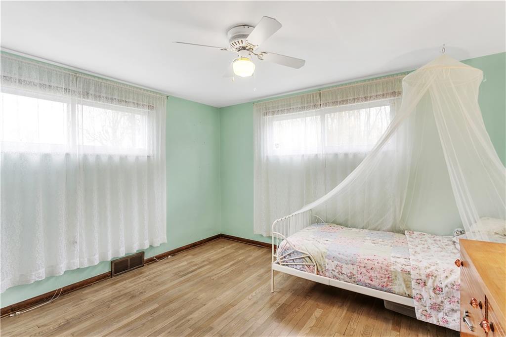 512 Middletown Road New Stanton, PA 15672 - Photo 15 of 24 a bedroom with a bed and a window