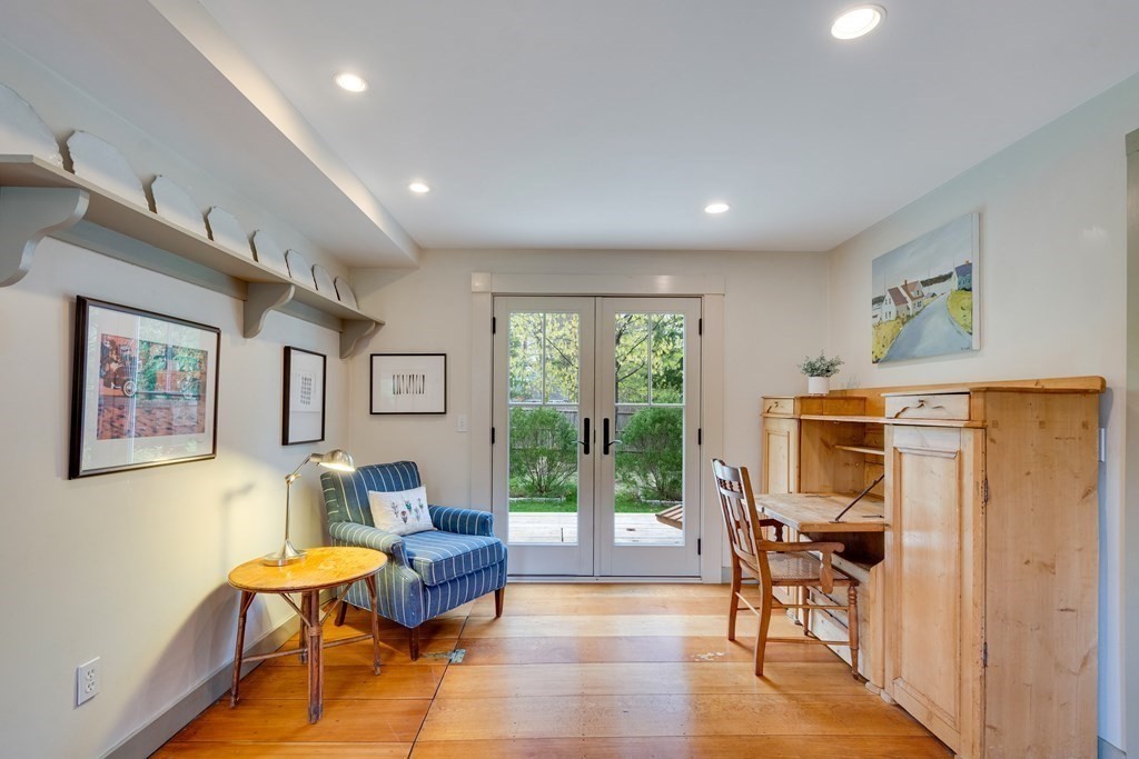 742 Barretts Mill Road Concord, MA 01742 - Photo 9 of 38 a living room with furniture and a window