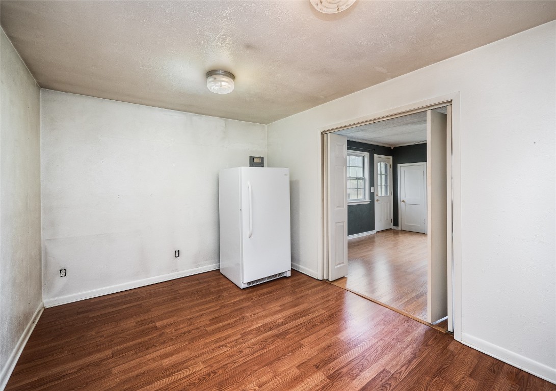 1350 County Road 414 Hamilton, TX 76531 - Photo 17 of 40 a view of a room with wooden floor and a sink