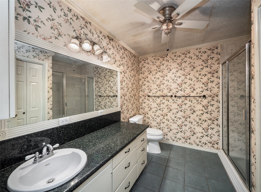 1350 County Road 414 Hamilton, TX 76531 - Photo 24 of 40 a bathroom with a sink and a mirror
