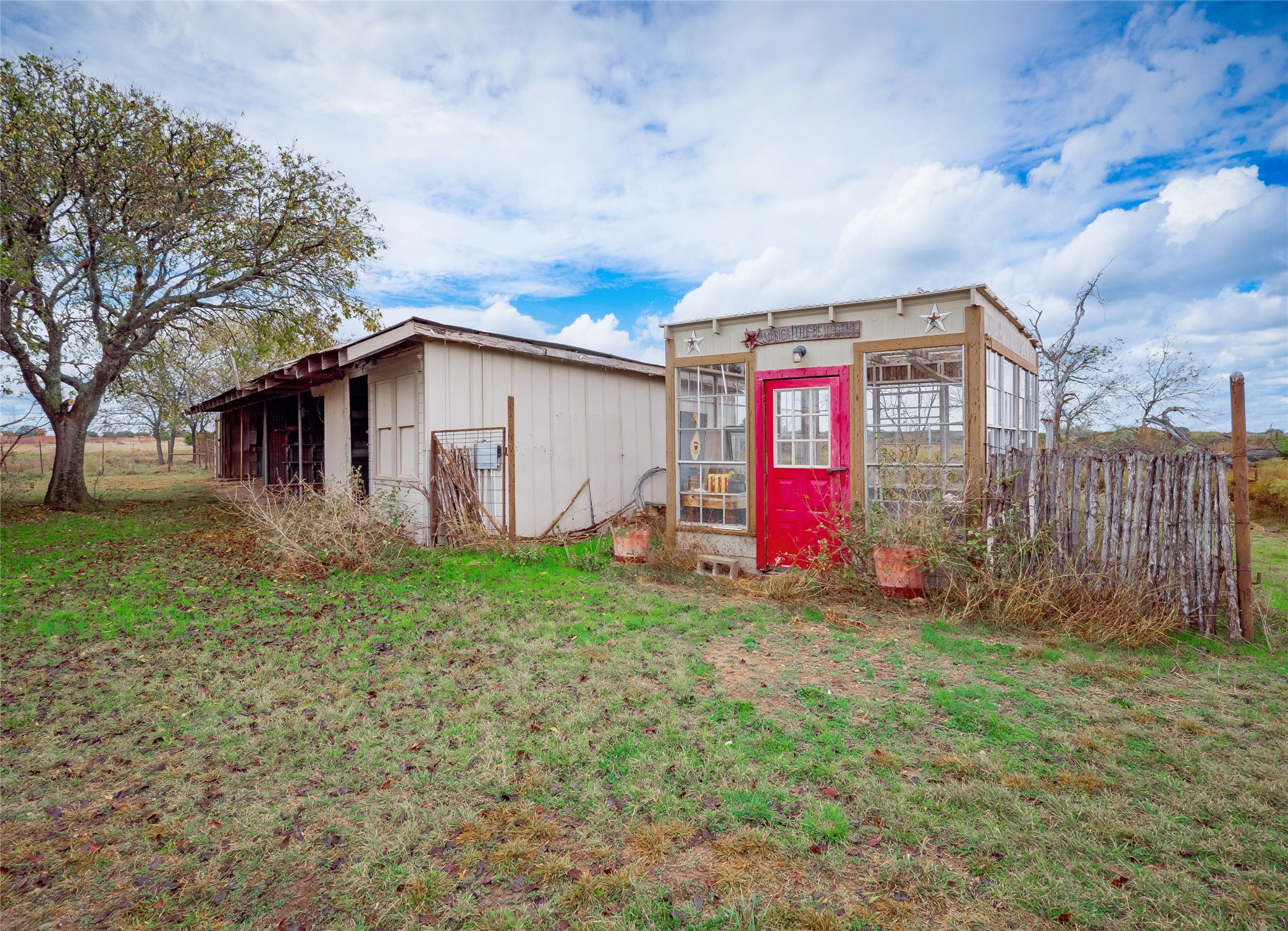 1350 County Road 414 Hamilton, TX 76531 - Photo 33 of 40 a view of a house with backyard and garden