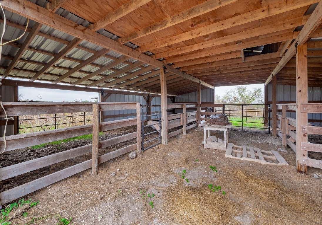 1350 County Road 414 Hamilton, TX 76531 - Photo 37 of 40 a view of an empty room with wooden roof