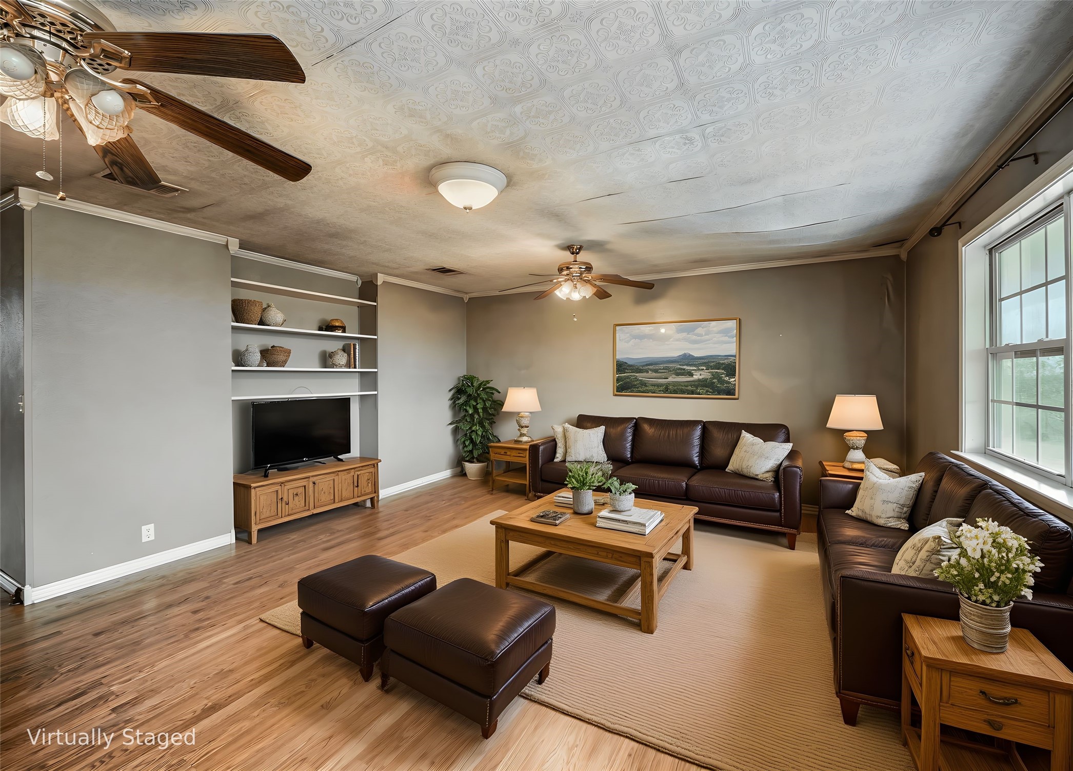 1350 County Road 414 Hamilton, TX 76531 - Photo 4 of 40 a living room with furniture and a fireplace