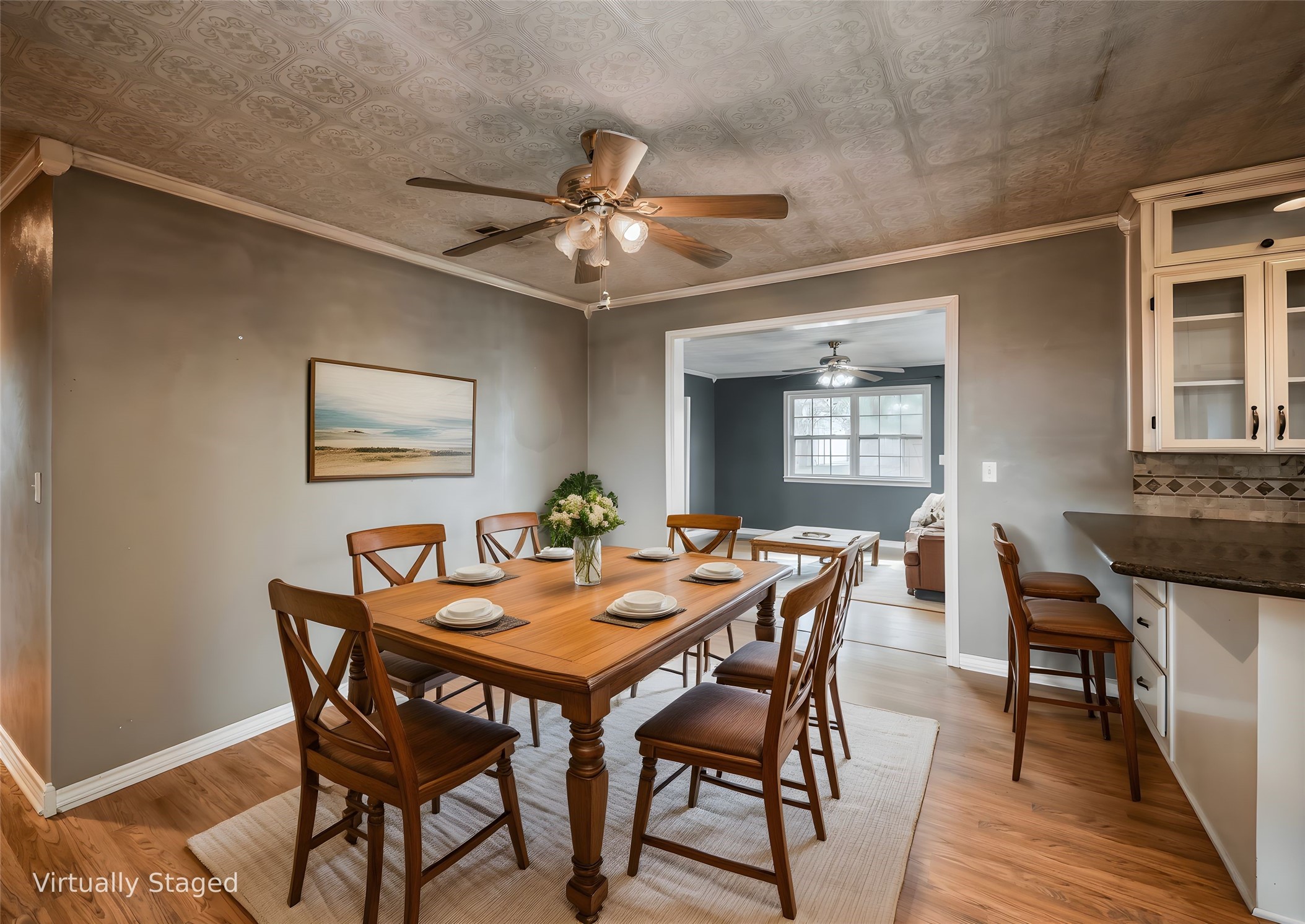 1350 County Road 414 Hamilton, TX 76531 - Photo 6 of 40 a view of a dining room with furniture and wooden floor