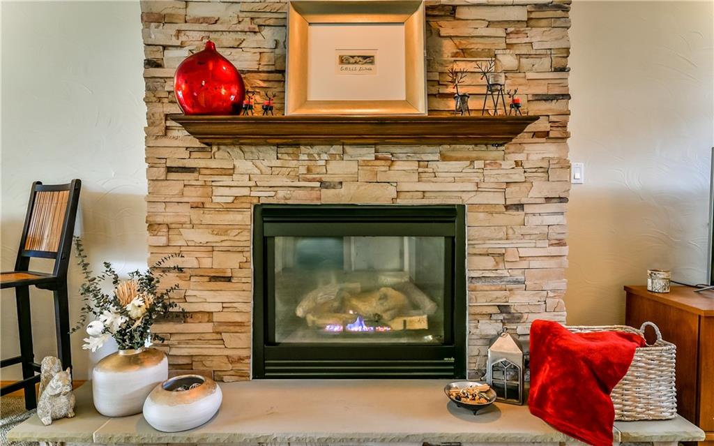 8409 Edwood Road Pittsburgh, PA 15237 - Photo 2 of 25 Family room accented by a stunning stone fireplace