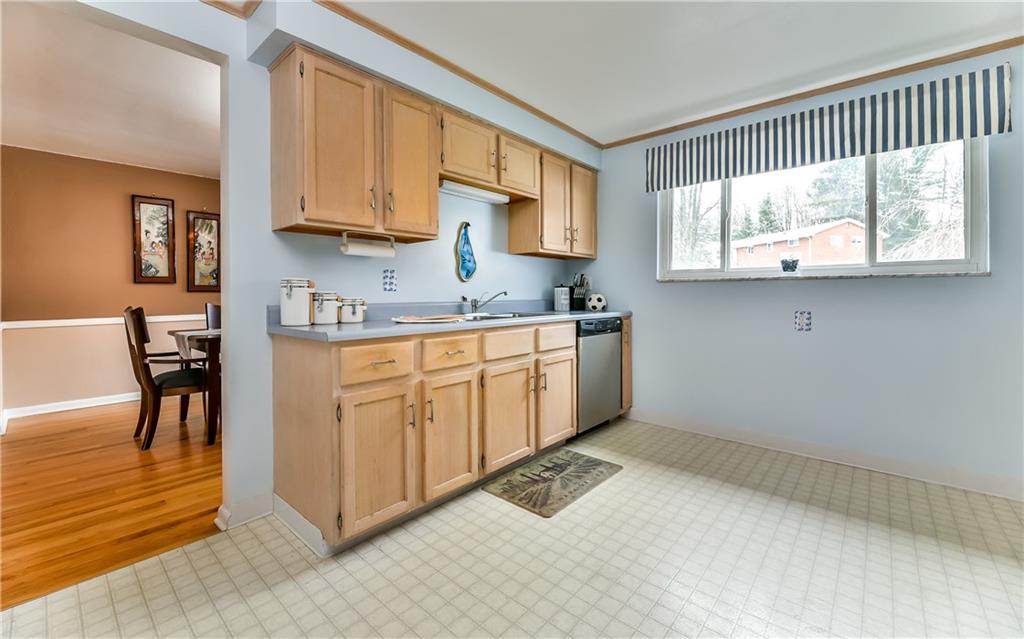 8409 Edwood Road Pittsburgh, PA 15237 - Photo 12 of 25 Neutral Open Kitchen right next to the dining room can fit in an island