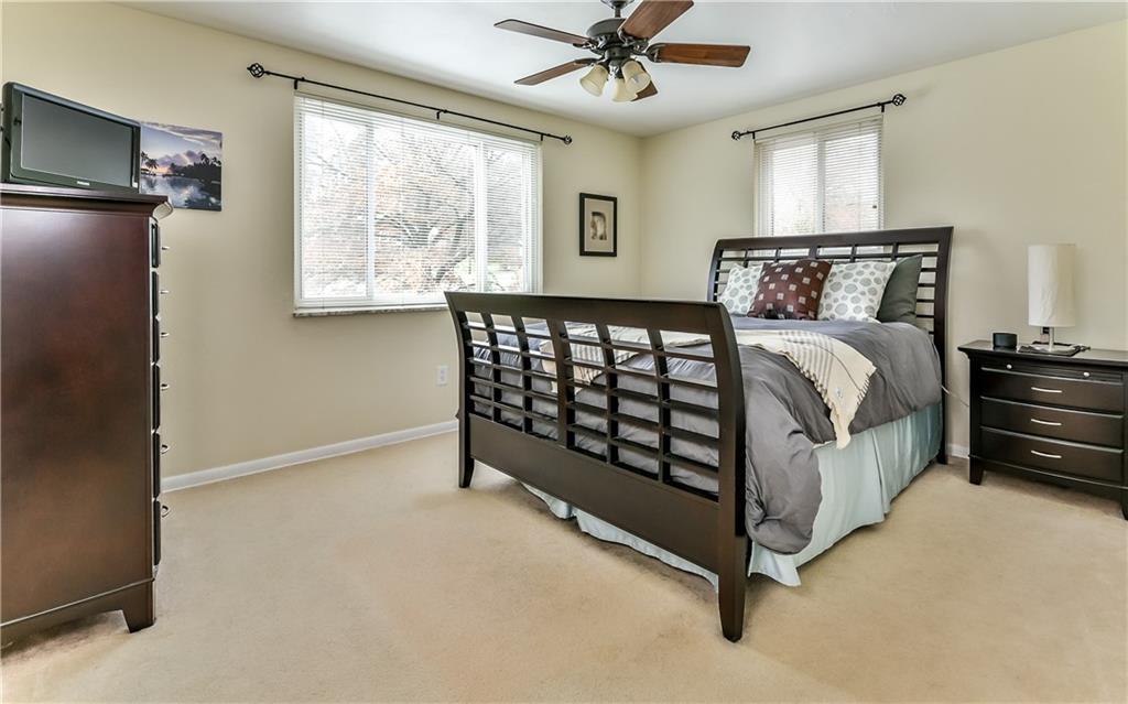 8409 Edwood Road Pittsburgh, PA 15237 - Photo 15 of 25 Master bedroom with double closet and large windows.