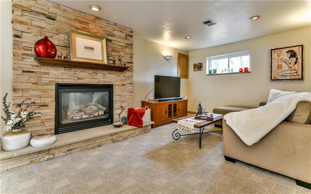 8409 Edwood Road Pittsburgh, PA 15237 - Photo 3 of 25 Cozy Family room offers both sitting and bar/game areas.