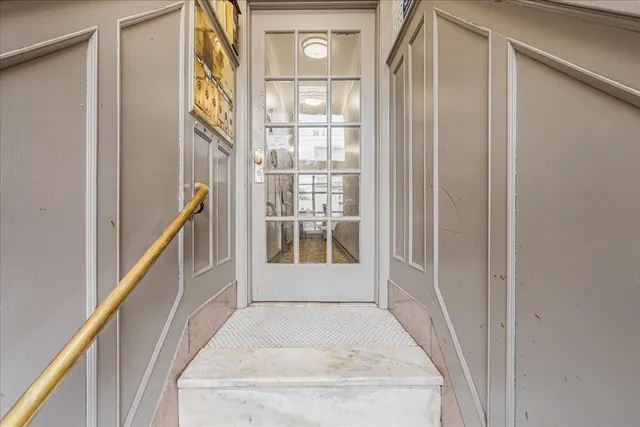 a front view of a house with a garage