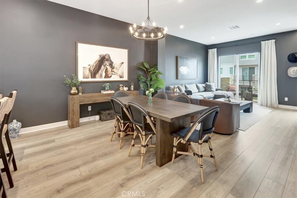 1810 West Bushell Street Anaheim, CA 92805 - Photo 9 of 36 a view of a dining room with furniture window and wooden floor