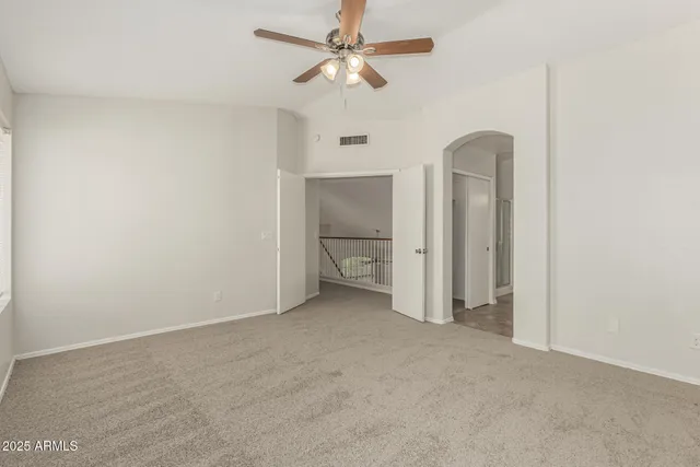 a kitchen with granite countertop cabinets and steel stainless steel appliances