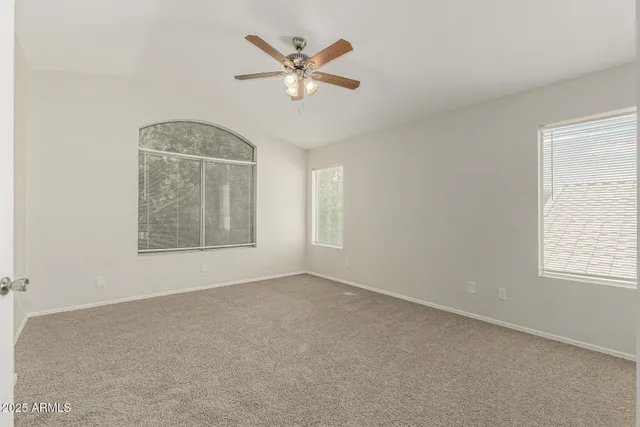 an empty room with a bathroom