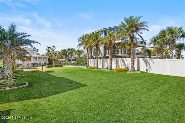 a view of an apartment with a garden