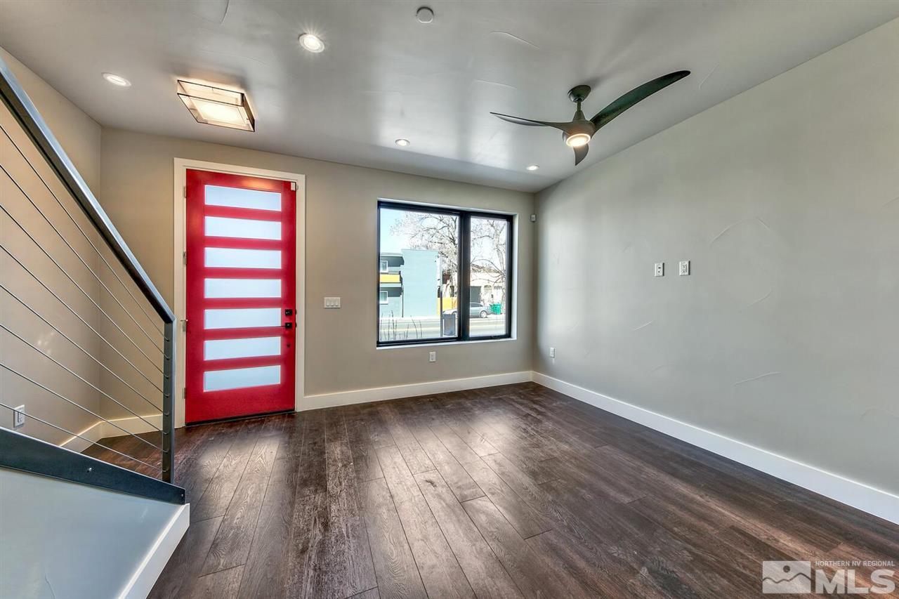 506 Mill Street Reno, NV 89502 - Photo 5 of 21 wooden floor in an empty room with a window