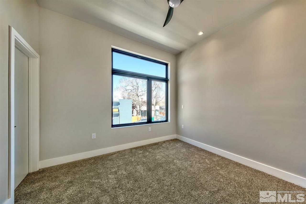 506 Mill Street Reno, NV 89502 - Photo 8 of 21 an empty room with windows