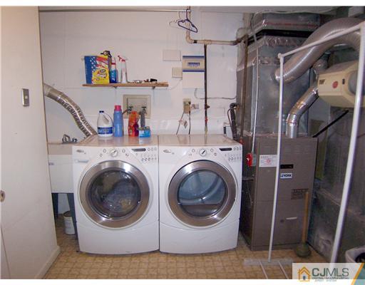 9 Glendale Road Colonia, NJ 07067 - Photo 14 of 19 a utility room with dryer and washer