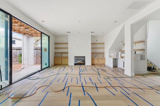 1106 Robbie Street Houston, TX 77009 - Photo 2 of 36 The spacious living area opens to a covered patio and welcoming backyard.