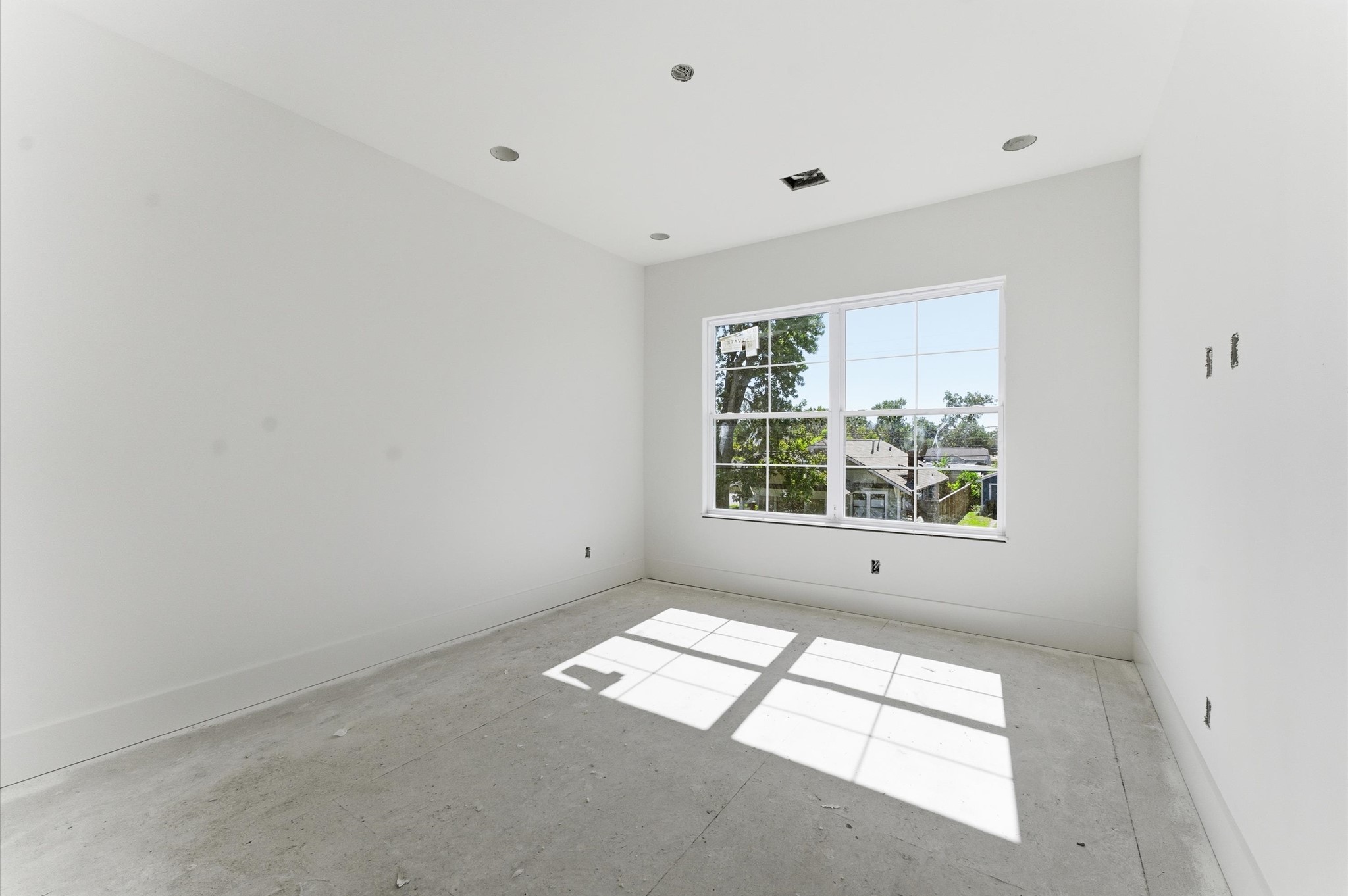 1106 Robbie Street Houston, TX 77009 - Photo 15 of 38 a view of an empty room with a window