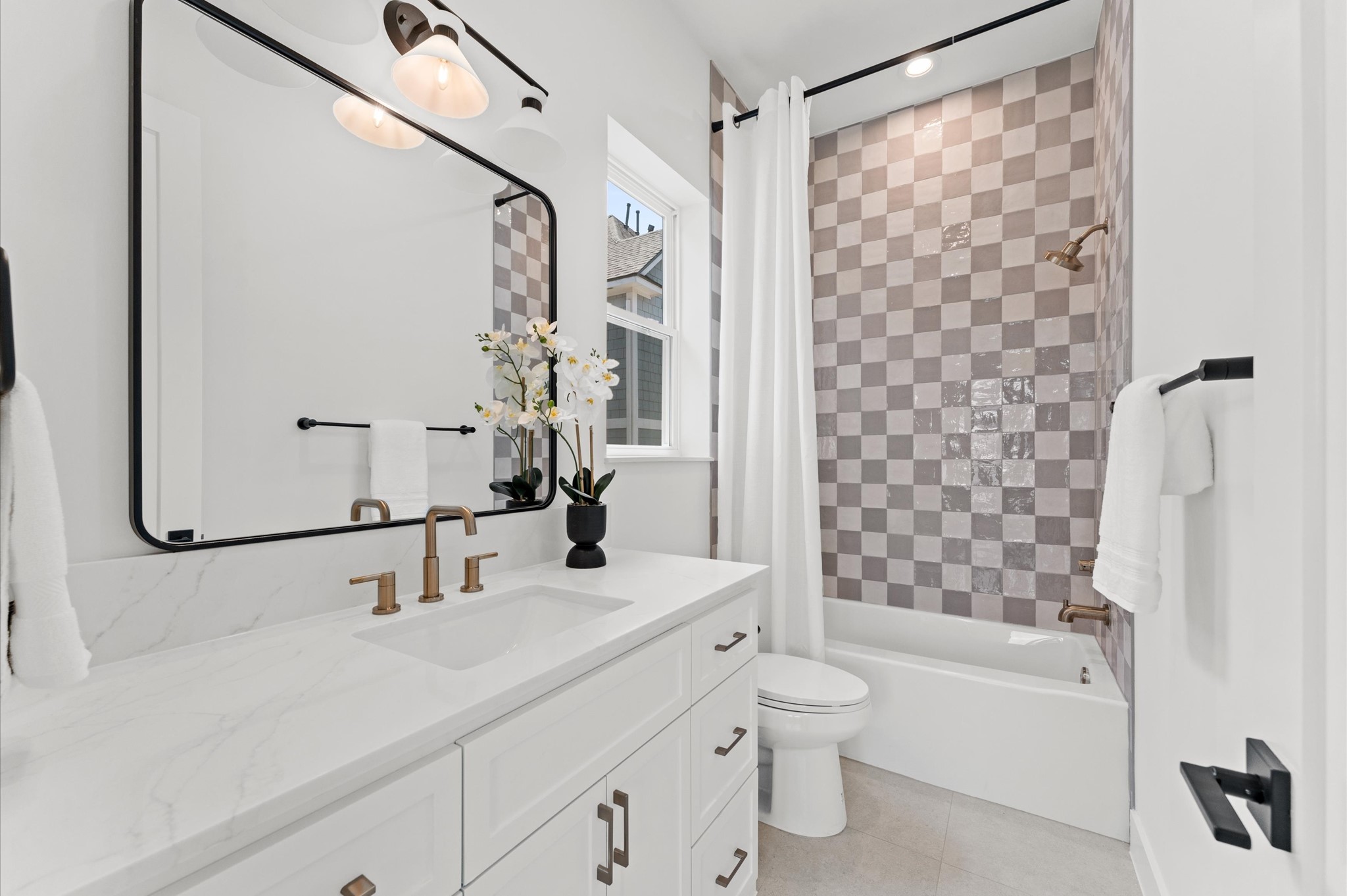 1106 Robbie Street Houston, TX 77009 - Photo 36 of 38 a bathroom with a sink toilet and shower