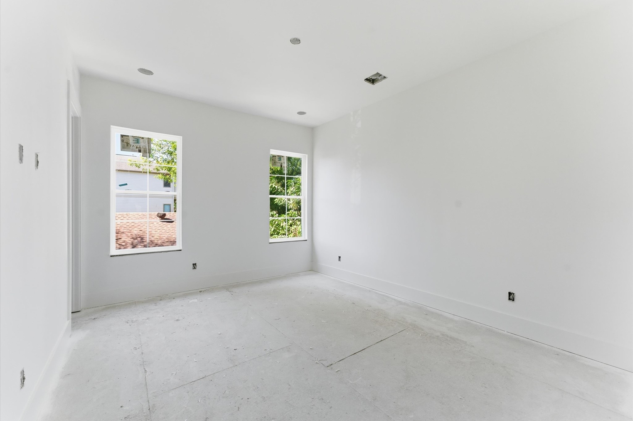 1106 Robbie Street Houston, TX 77009 - Photo 18 of 38 an empty room with windows
