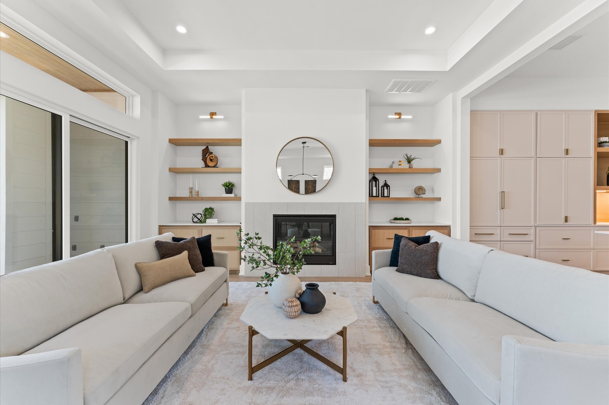 1106 Robbie Street Houston, TX 77009 - Photo 25 of 38 a living room with furniture a fireplace and a large window