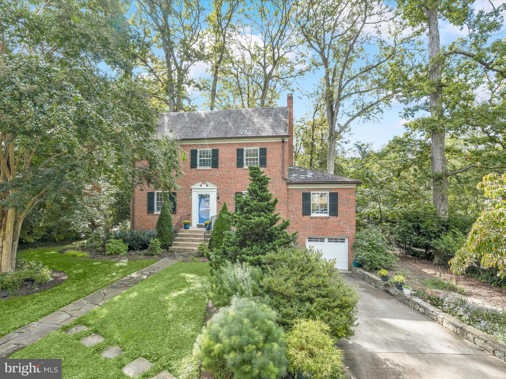 4005 Clagett Road Hyattsville, MD 20782 - Photo 1 of 50 a front view of a house with garden