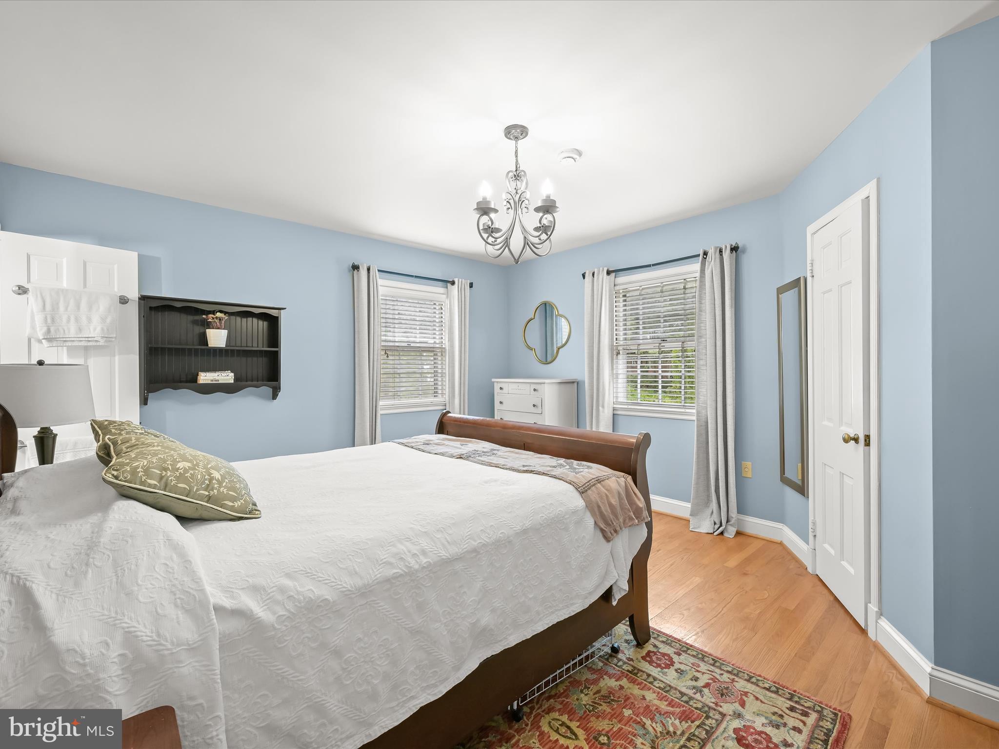 4005 Clagett Road Hyattsville, MD 20782 - Photo 17 of 50 a bedroom with bed large window and tv