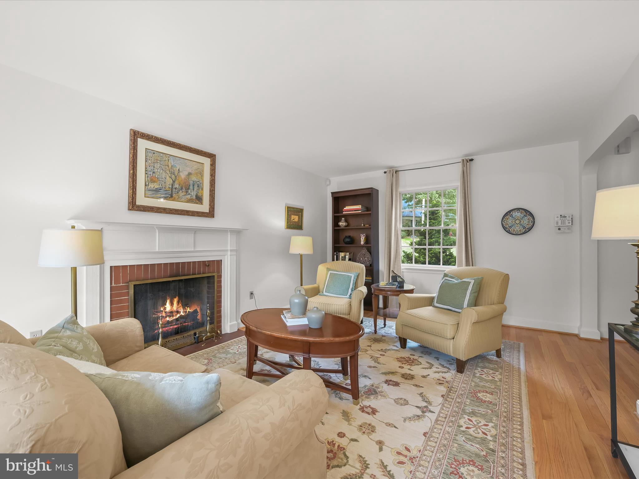 4005 Clagett Road Hyattsville, MD 20782 - Photo 3 of 50 a living room with furniture and a fireplace