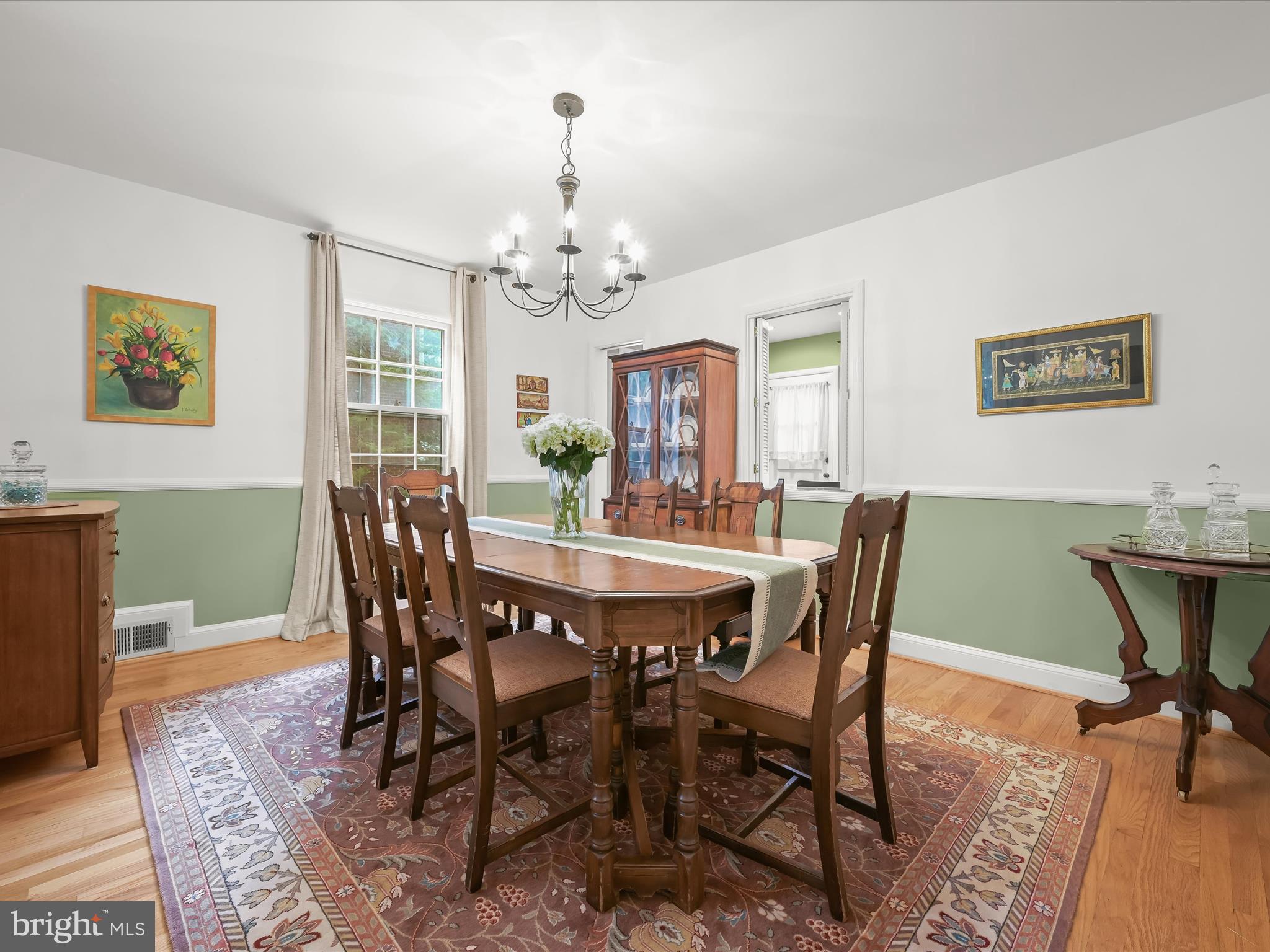 4005 Clagett Road Hyattsville, MD 20782 - Photo 6 of 50 a view of a dining room with furniture window and wooden floor